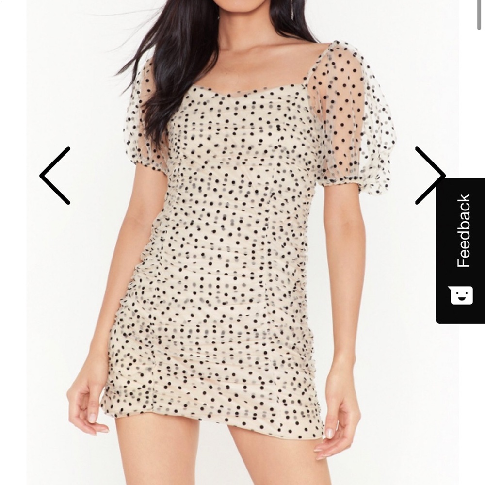 Beige and black polka dot mini dress
